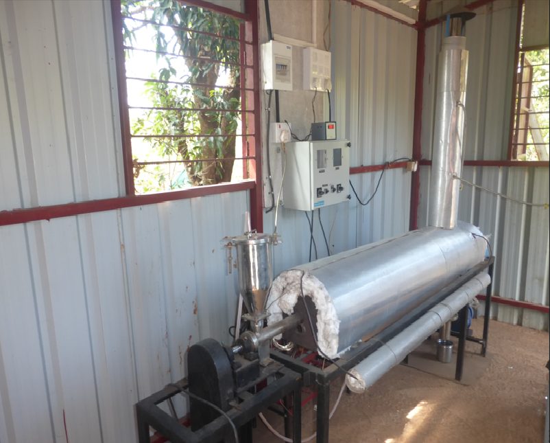 Pilot plant for a novel process for manufacture of activated carbons